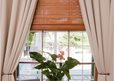 Oakdene Guest House flower in front of window