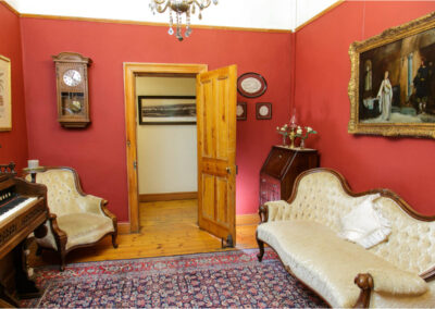 Oakdene Guest House room with piano